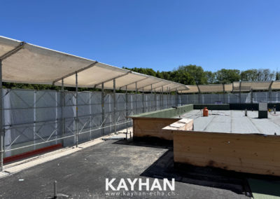 Echafaudage et toiture d'acrotère avec Kayhan